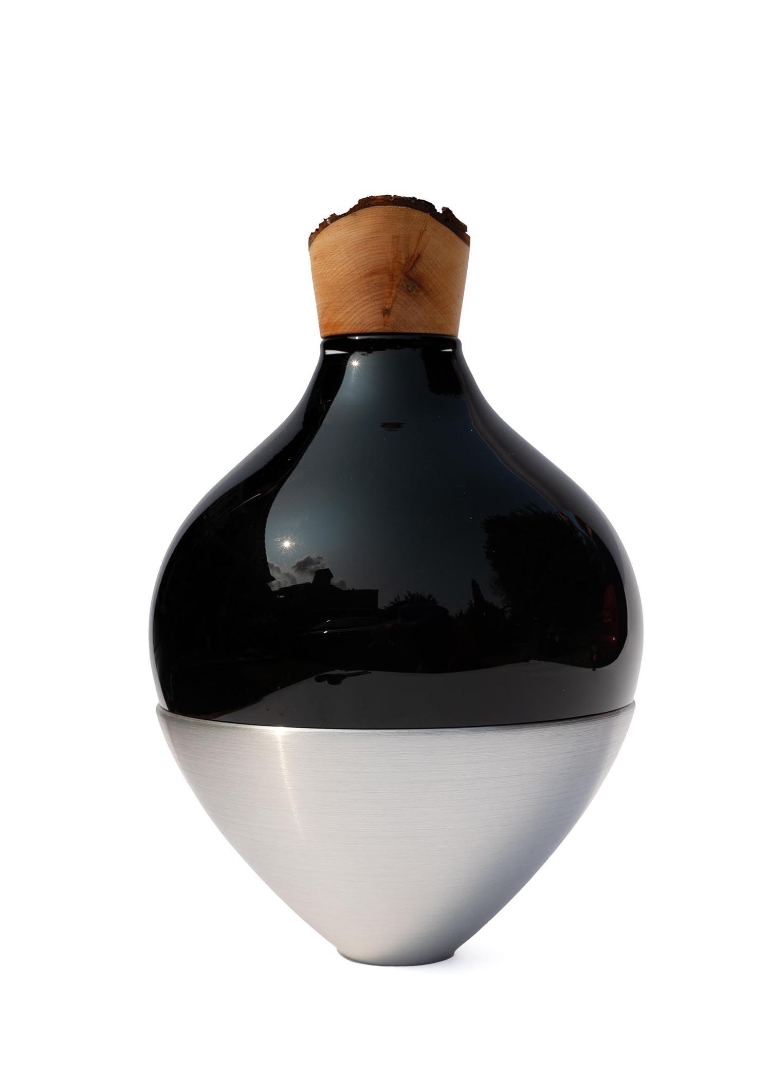 India II Stacking Vessel in Black Aluminium, featuring a sleek black finish with industrial-inspired aluminium details.