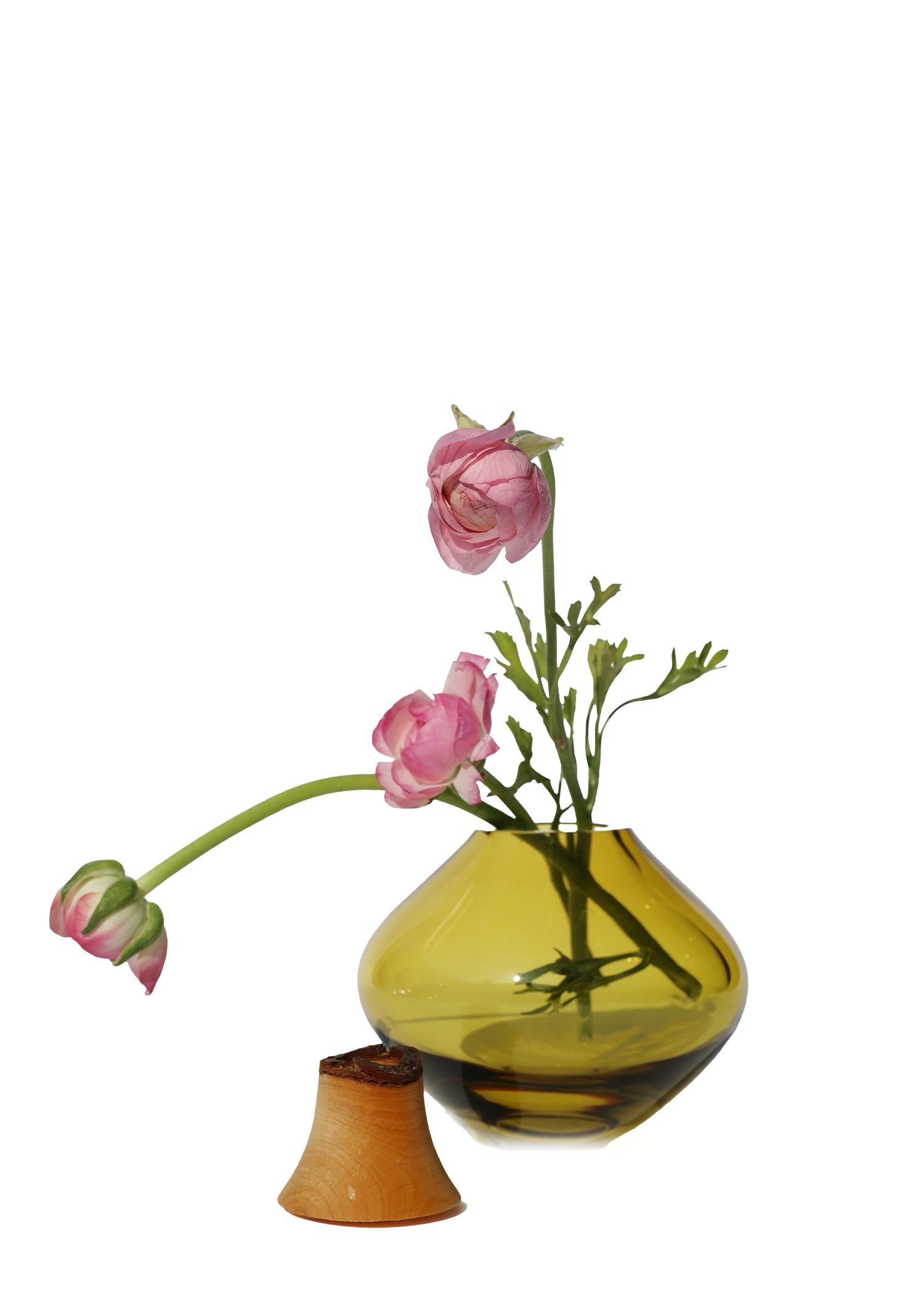 Matisse II Amber Stacking Vessel unstacked with flowers, highlighting the intricate design and elegant details.