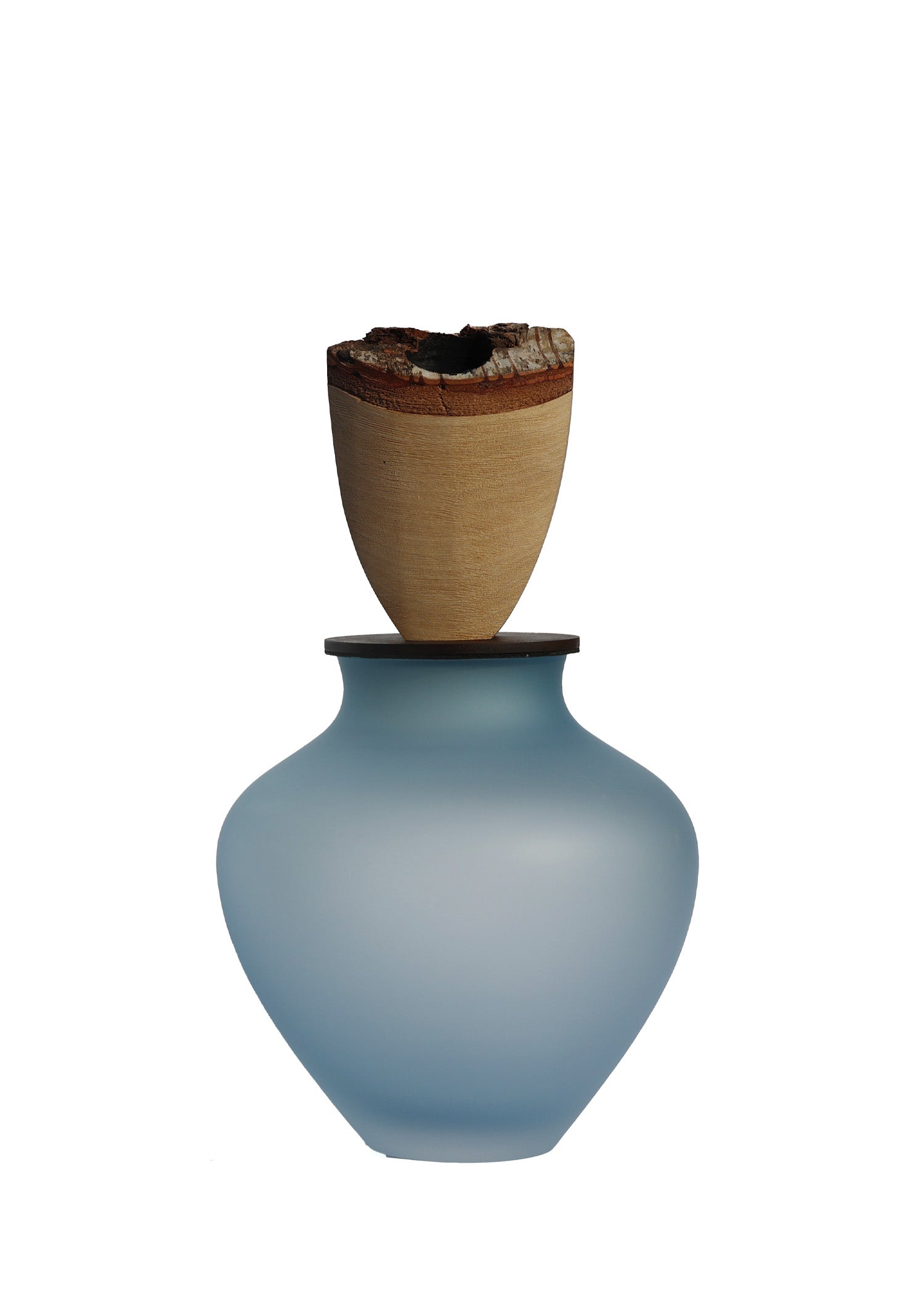 Ohana Stacking Vessel in Blue Satin, showcasing its elegant layered design and smooth texture.