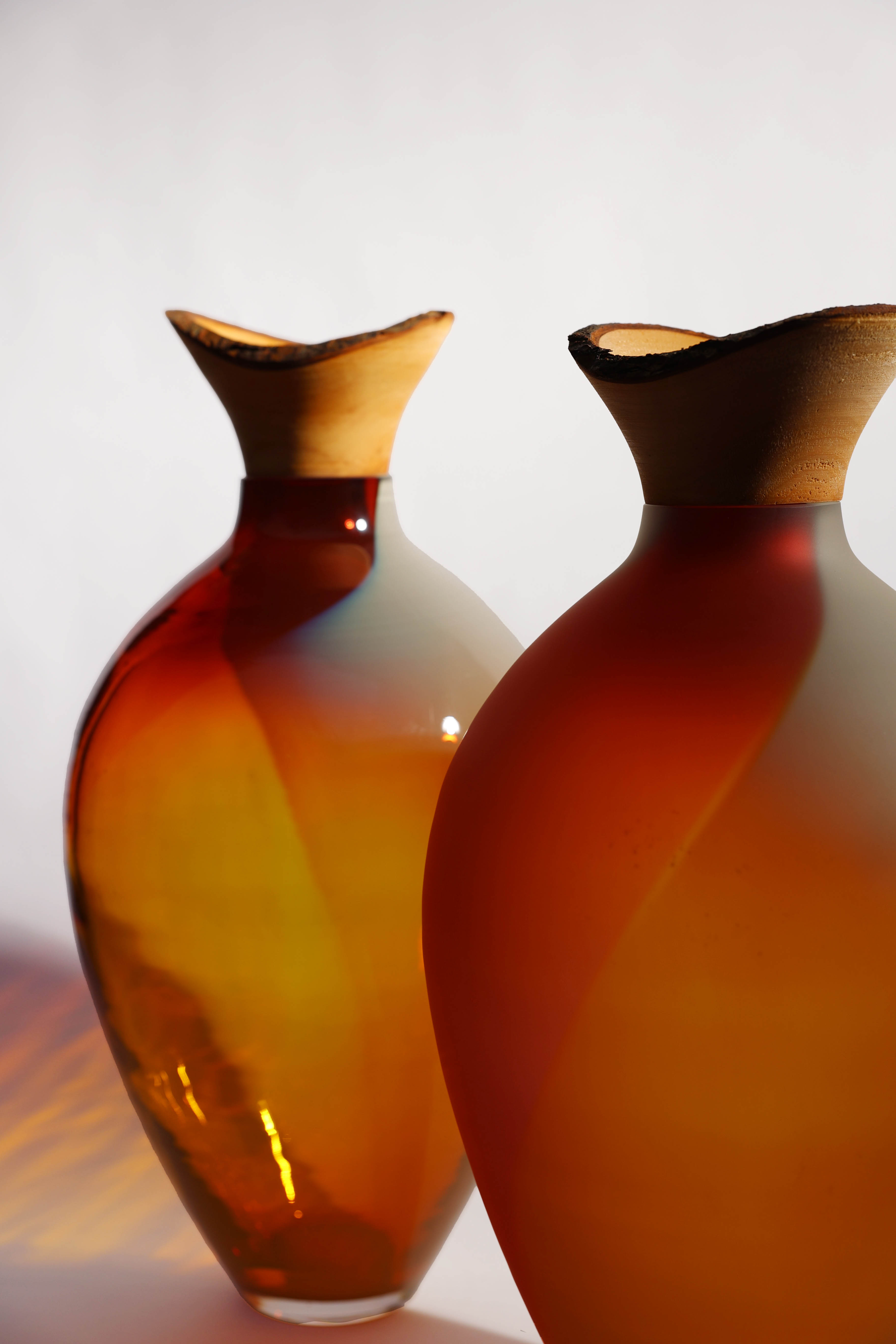 Splash | Stacking Vessel in dual coloured glass with a wood crown