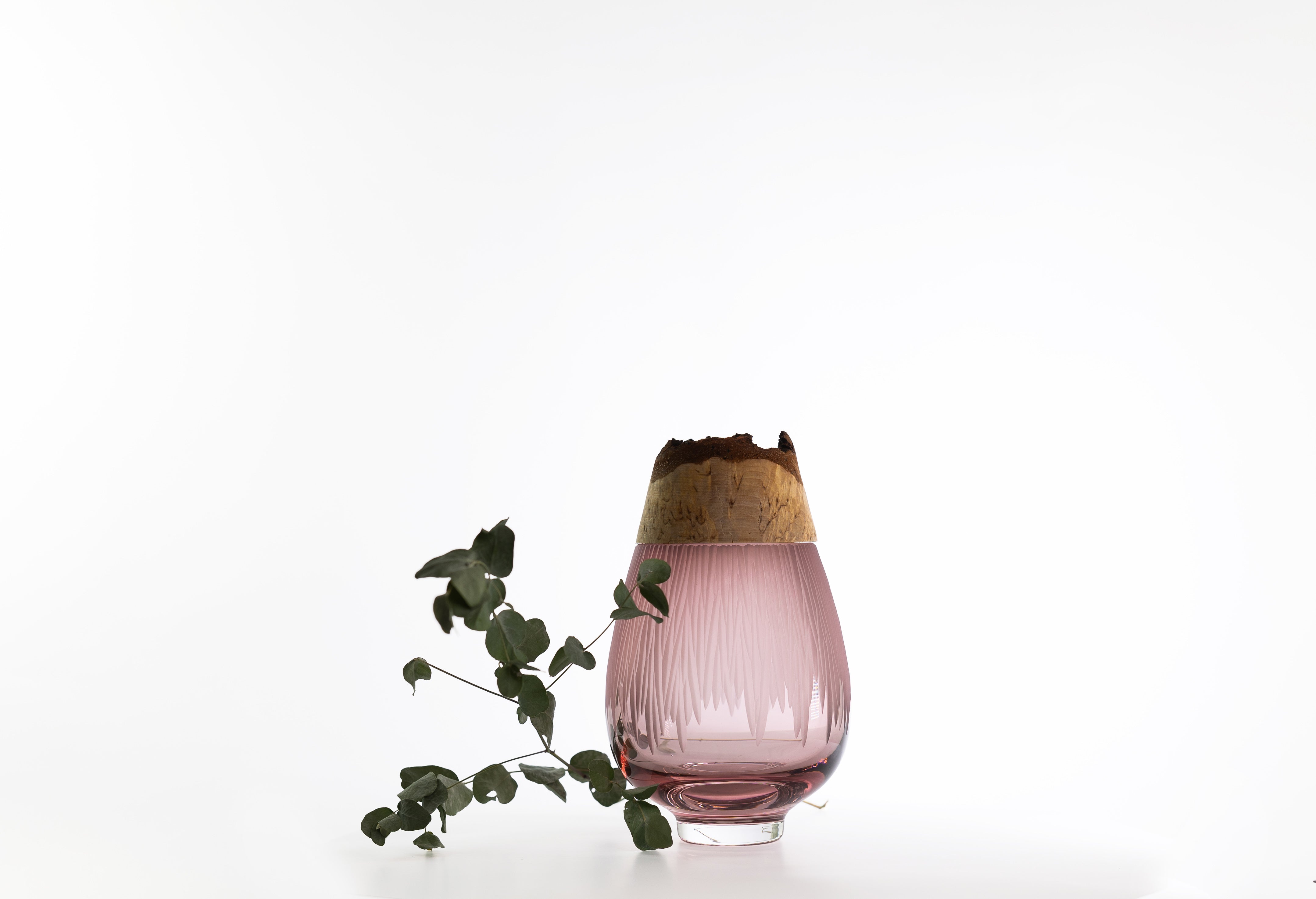  Stacking Vessel Frida in Rose with branch, meticulously cut with a diamond wheel for precise detailing and refined craftsmanship.