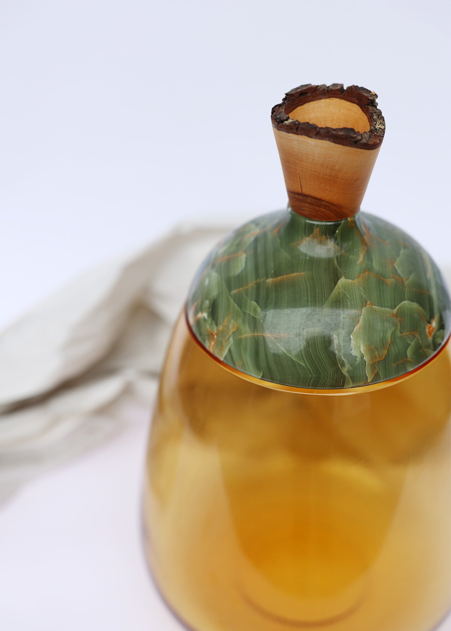 Terra Stacking Vessel in Onyx, showcasing a bold and elegant stacked design with rich, dark tones, detail.